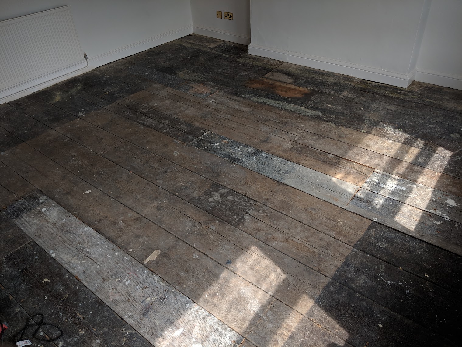 Burn finish floorboards