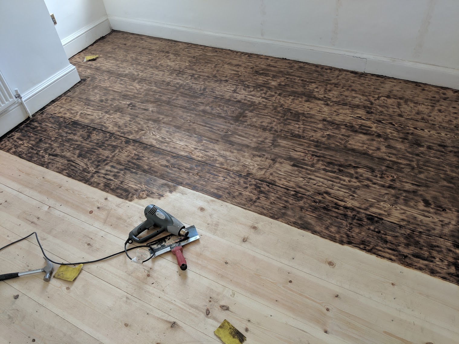 Burn finish floorboards