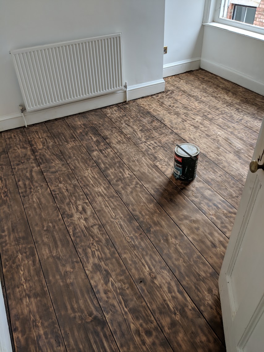 Burn finish floorboards