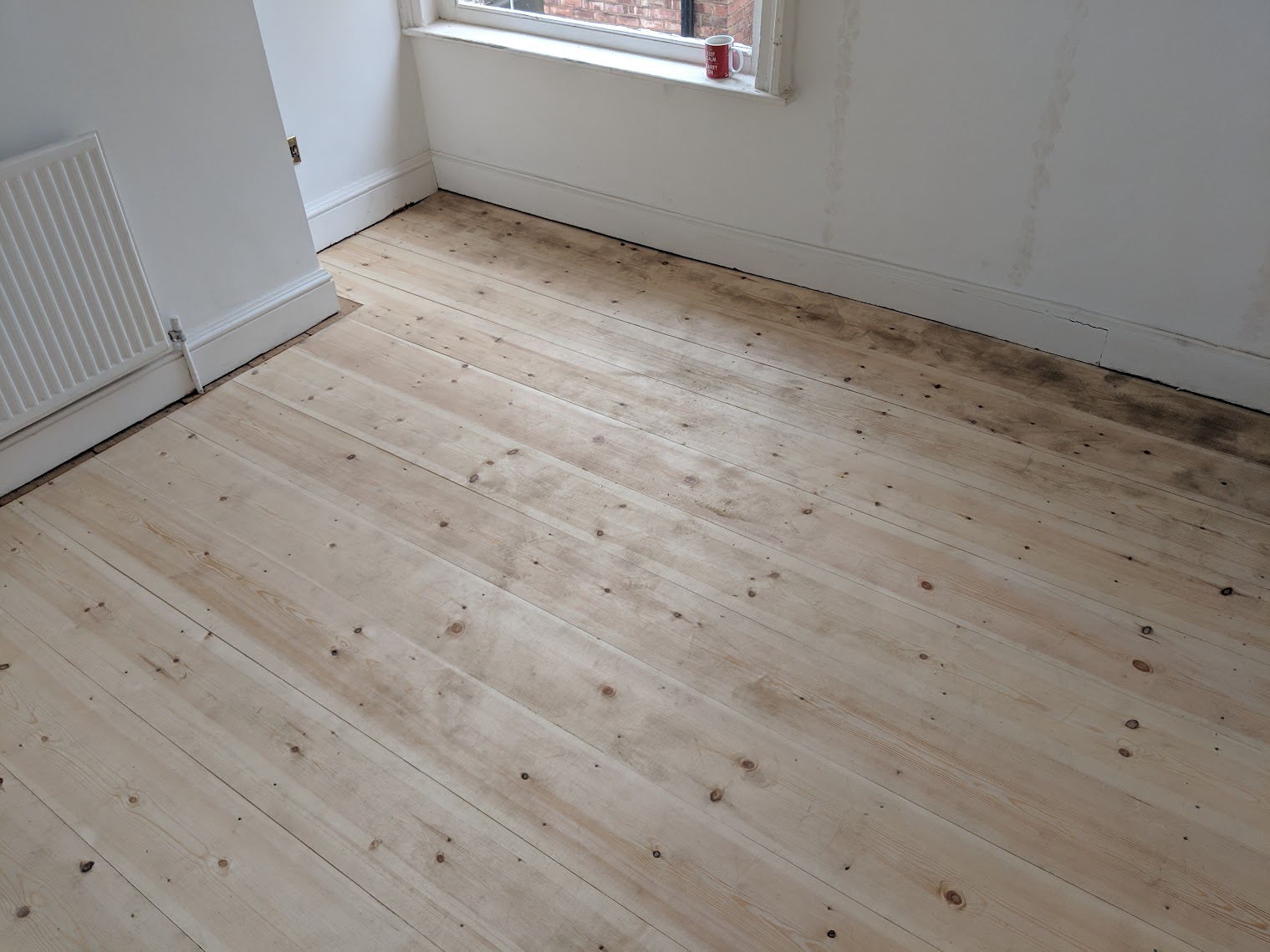 Burn finish floorboards