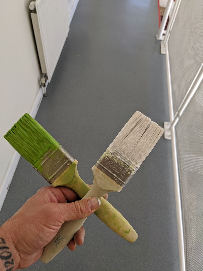 Green and White Paint Brushes image